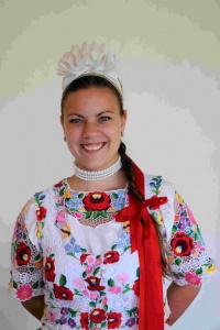 Young girl wearing a costume with traditional Kalocsa embroidery.