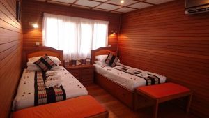 We are given the central cabin, "recently occupied by the King of Norway", reveals the onboard manager. It's a little more spacious than the other 4, but all are very functional and dressed in teak.