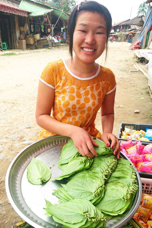 At the market, we are offered betel leaves and areca nuts to chew. 