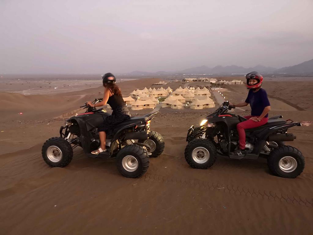Quad biking in the dunes of Wadi al Abiyad.
