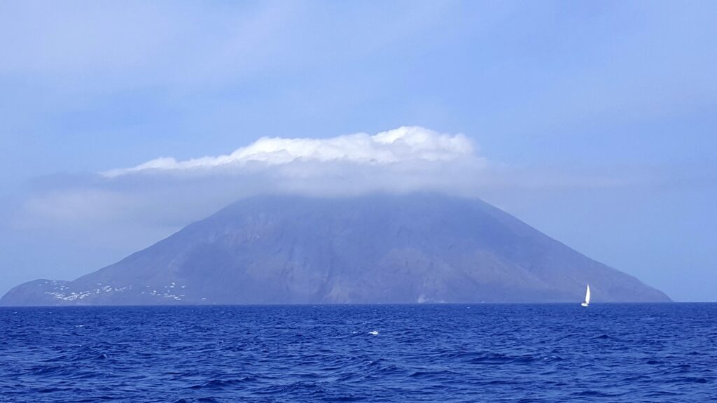We pass off Stromboli, in Italian Isola di Stromboli, a volcanic island in Italy, part of the Aeolian Islands.