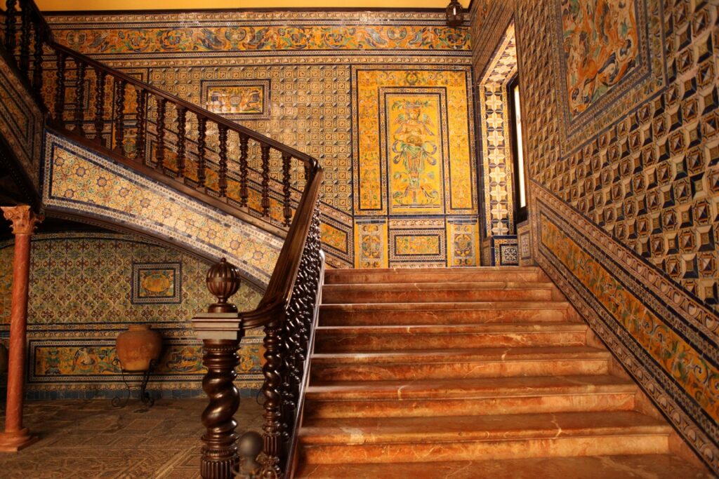 Seville. Lebrija Palace in the Triana district, staircase decorated with 16th and 17th century azulejos.