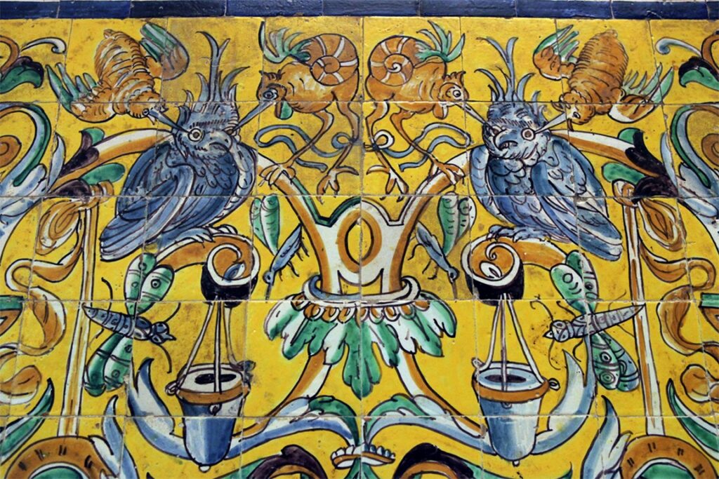 Seville. Alcazar. Drawing room of Charles Quin. Azulejos depicting an owl being harassed by two birds.