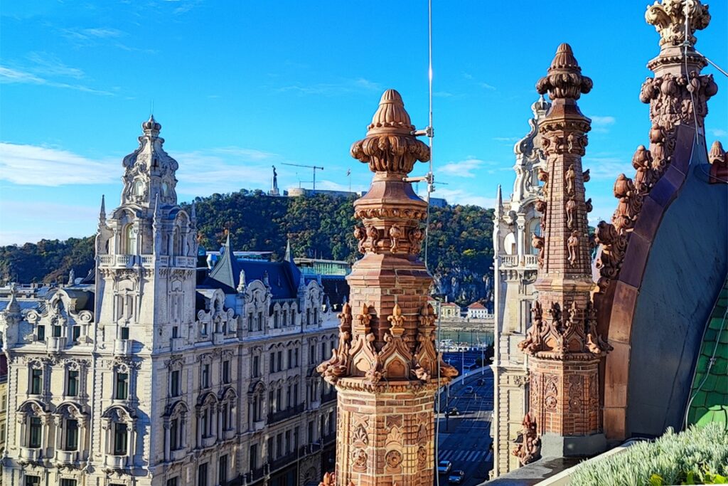 Hungary. Budapest. Oriental-inspired bell towers crown the Parisi Udvar hotel. B. Postel.