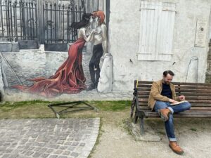 Angoulême. "Mémoires du XXe Ciel" by Yslaire - Square Saint André. This fresco, created by comic strip artist Yslaire, is nestled in the heart of the city in the Square Saint-André. This fresco is without doubt the most romantic of all the city's painted walls.