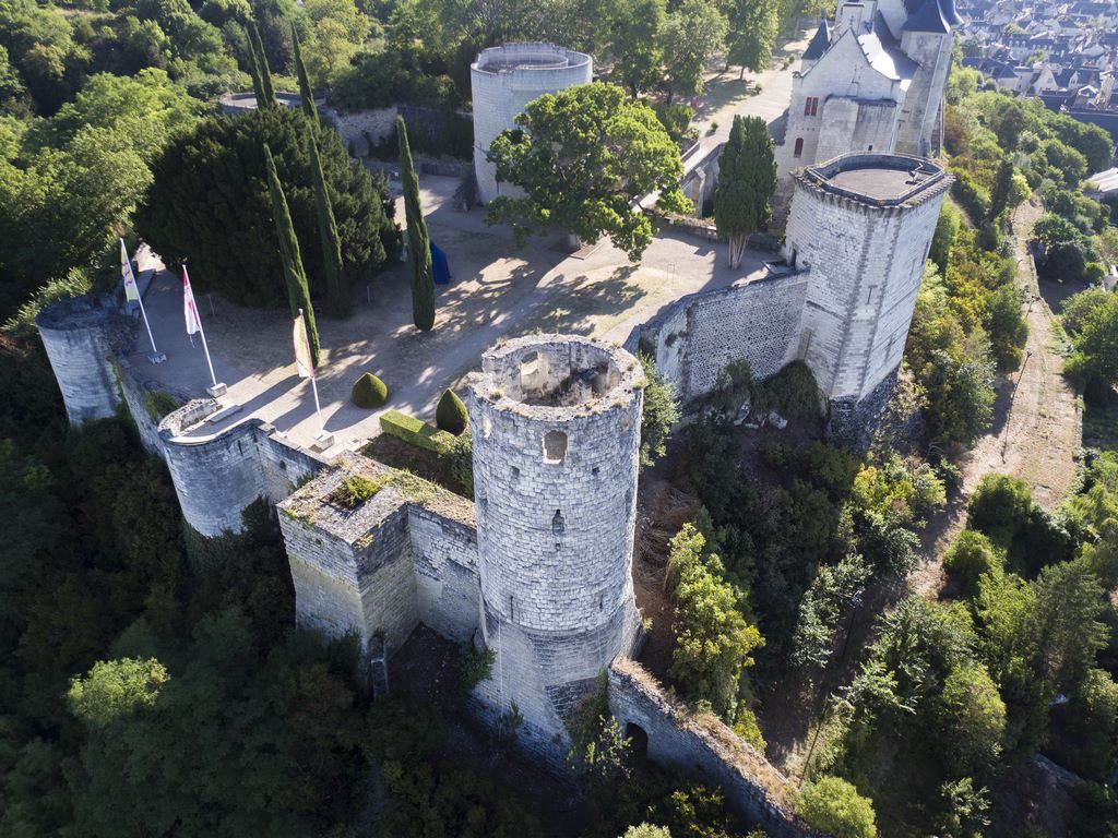 France. Chinon. Aerial view. The Fort du Coudray is the oldest part of the castle. In the foreground is the Tour du Moulin, with the Tour de Boissy on the right and the 13th-century keep in the background. It was here that the Knights Templar, including Grand Master Jacques de Molay, were imprisoned by King Philippe IV le Bel of France before being sentenced to death.  OT Chinon.