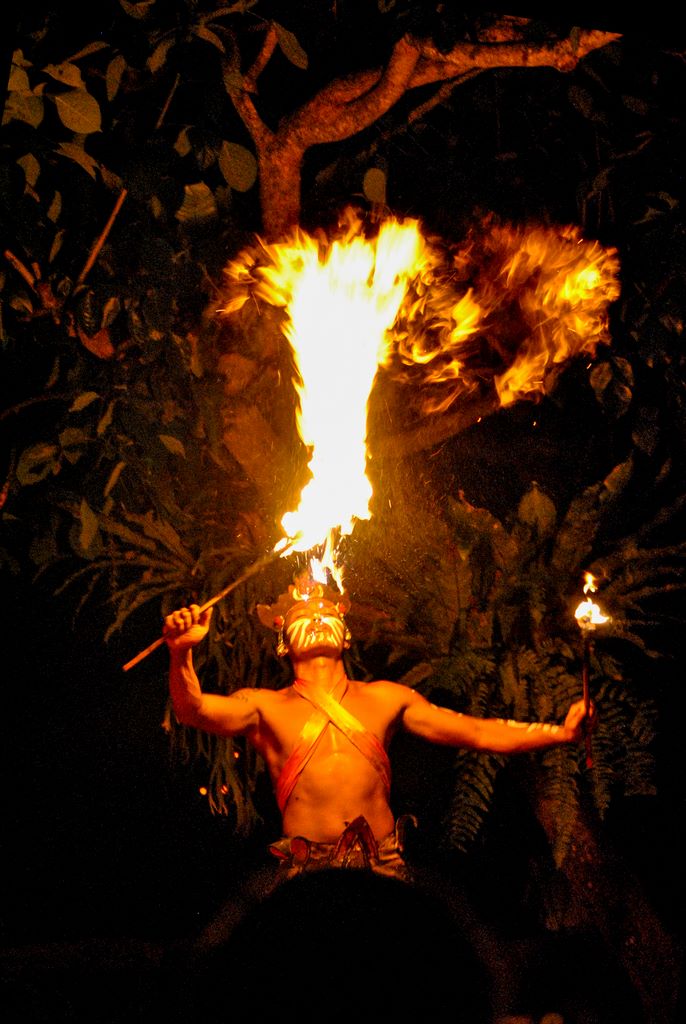 Indonesia. Bali. During the Sanghiang, the dancer in a trance invokes the spirits by holding a flaming stick. 