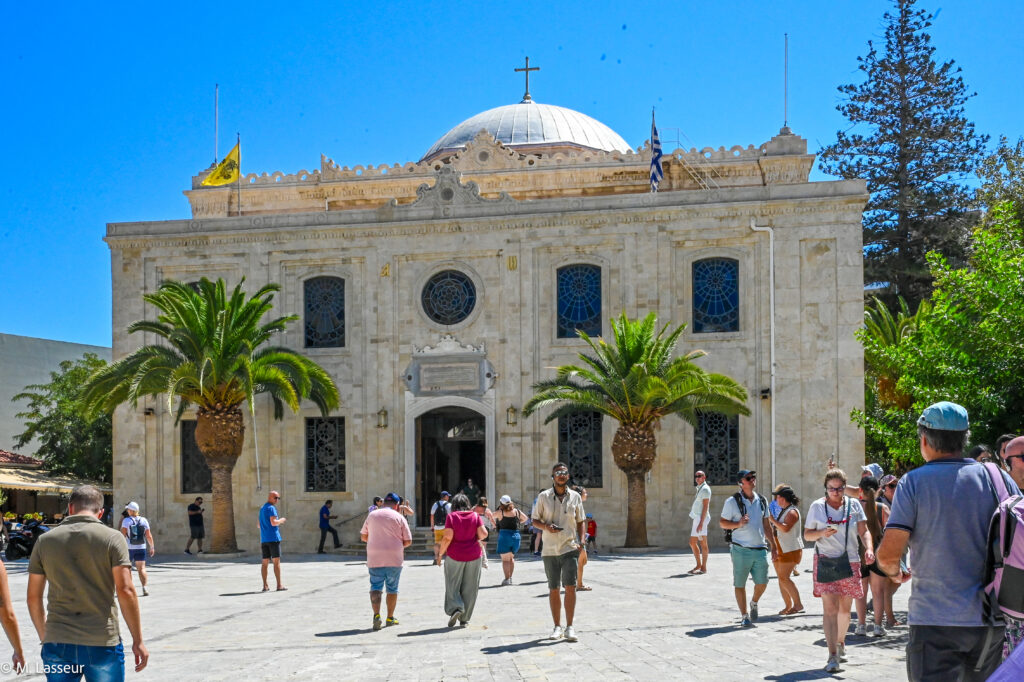 Crete. Heraklion. Saint Titus (Agios Titos), patron saint of the island and the church, was the first bishop of Crete. Built in 961 in his honour, this church was rebuilt after several earthquakes and a fire, and became an Orthodox church once again after the fall of the Ottoman Empire. M. Lasseur.
