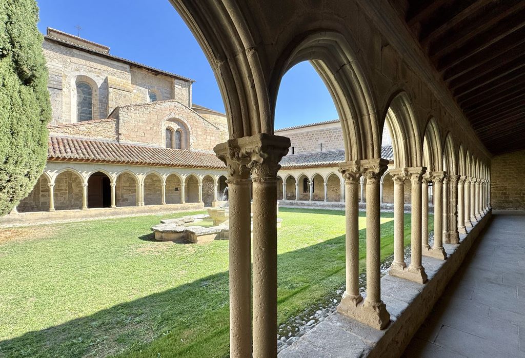 France. Built in the first half of the 14th century on the site of the chapel built at the request of Saint-Hilaire, the first bishop of Carcassonne, the cloister of the Abbey of Saint-Hilaire is shaped like an irregular trapezium and has 54 arcades.