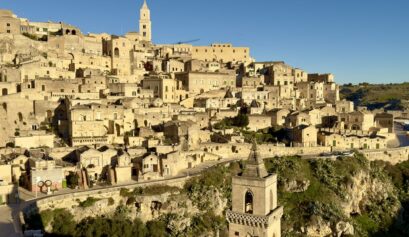 Matera, Italy. Situated on a rocky outcrop in the Basilicata region of southern Italy, Matera is home to the famous Sassi, a group of troglodyte dwellings carved into the mountainside.
