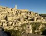 Matera, Italy. Situated on a rocky outcrop in the Basilicata region of southern Italy, Matera is home to the famous Sassi, a group of troglodyte dwellings carved into the mountainside.