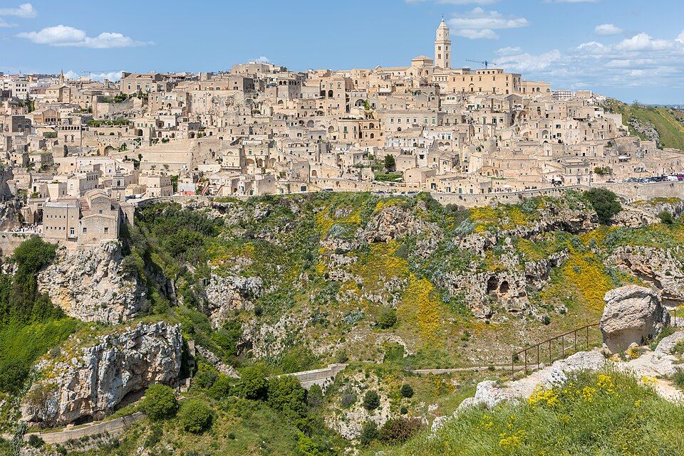 Italy. Matera. For the best panoramic view of Matera, cross the canyon (the Gravina) and go to the Parco della Murgia Materana. It's on the other side of the valley that you get this iconic view. Benjamin Smith/Commons.